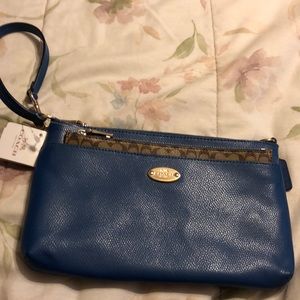 Coach wristlet with extra pouch